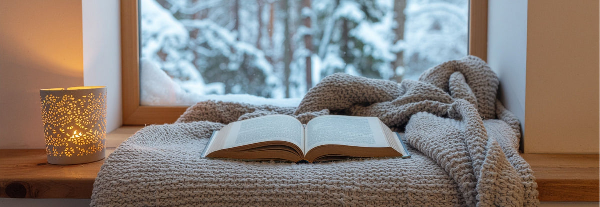 book on a windowsill in winter