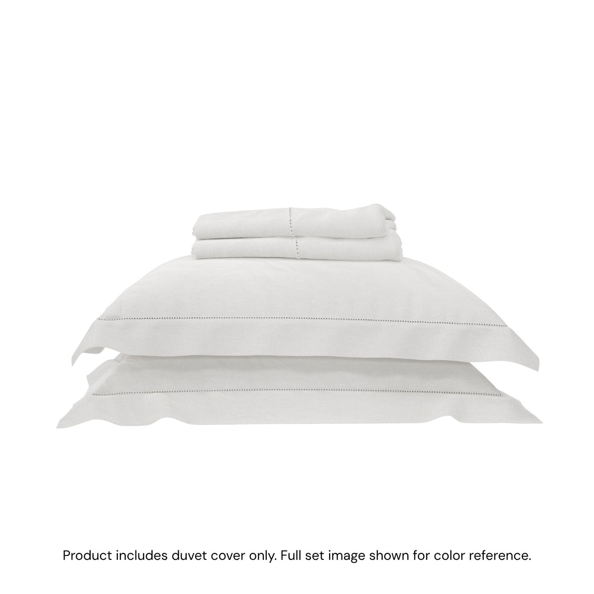 A duvet cover folded on top of two pillow shams #color_arctic snow