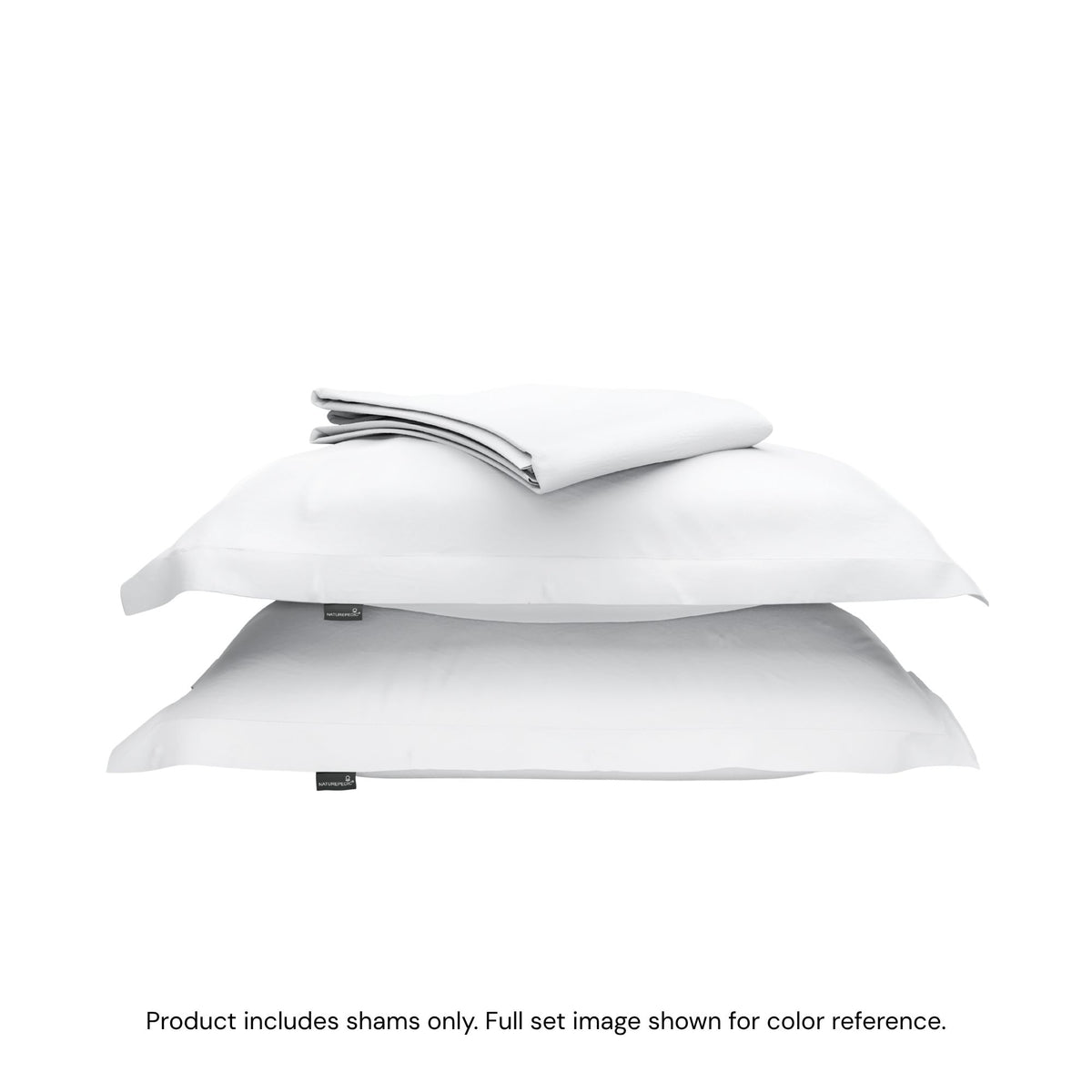 A duvet cover folded on top of two pillow shams #color_arctic snow