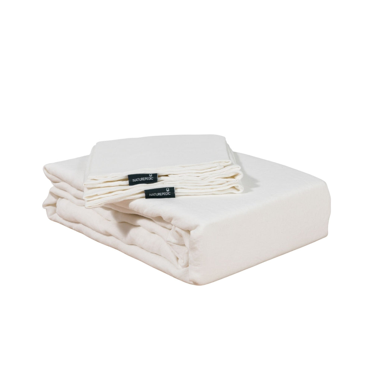 Folded linen duvet cover and shams against a white background #color_arctic snow