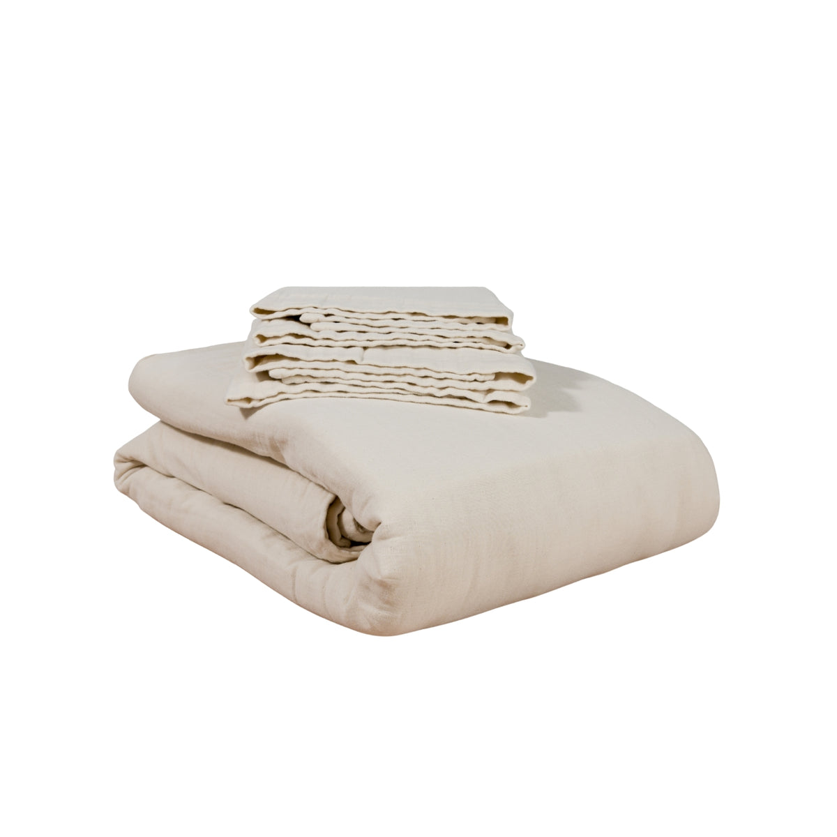 Folded duvet set against a white background #color_cream