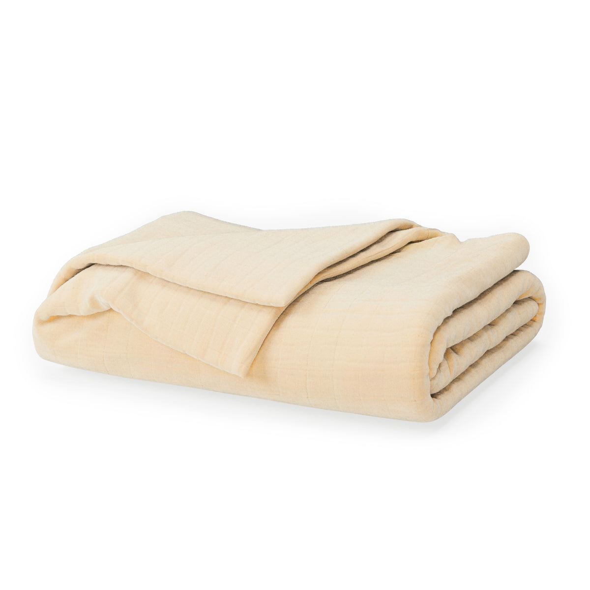 A folded cotton muslin blanket with a subtle grid texture, shown on a white background. #color_buttercream