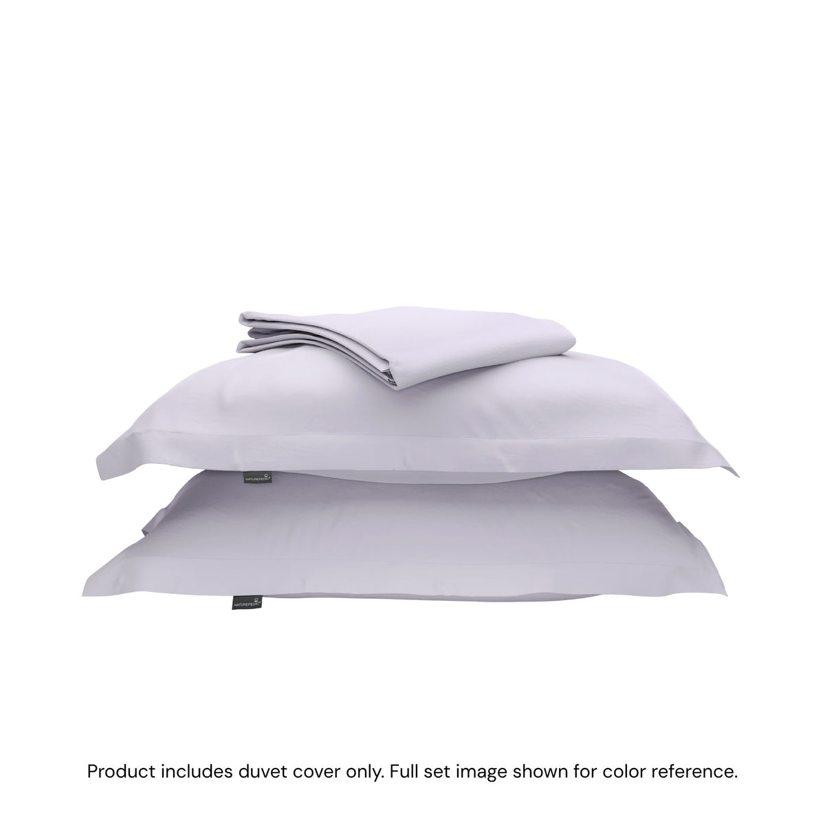 A folded duvet cover on top of two shams against a white background #color_wild bergamot