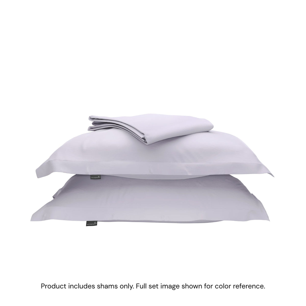 A duvet cover folded on top of two pillow shams #color_wild bergamot